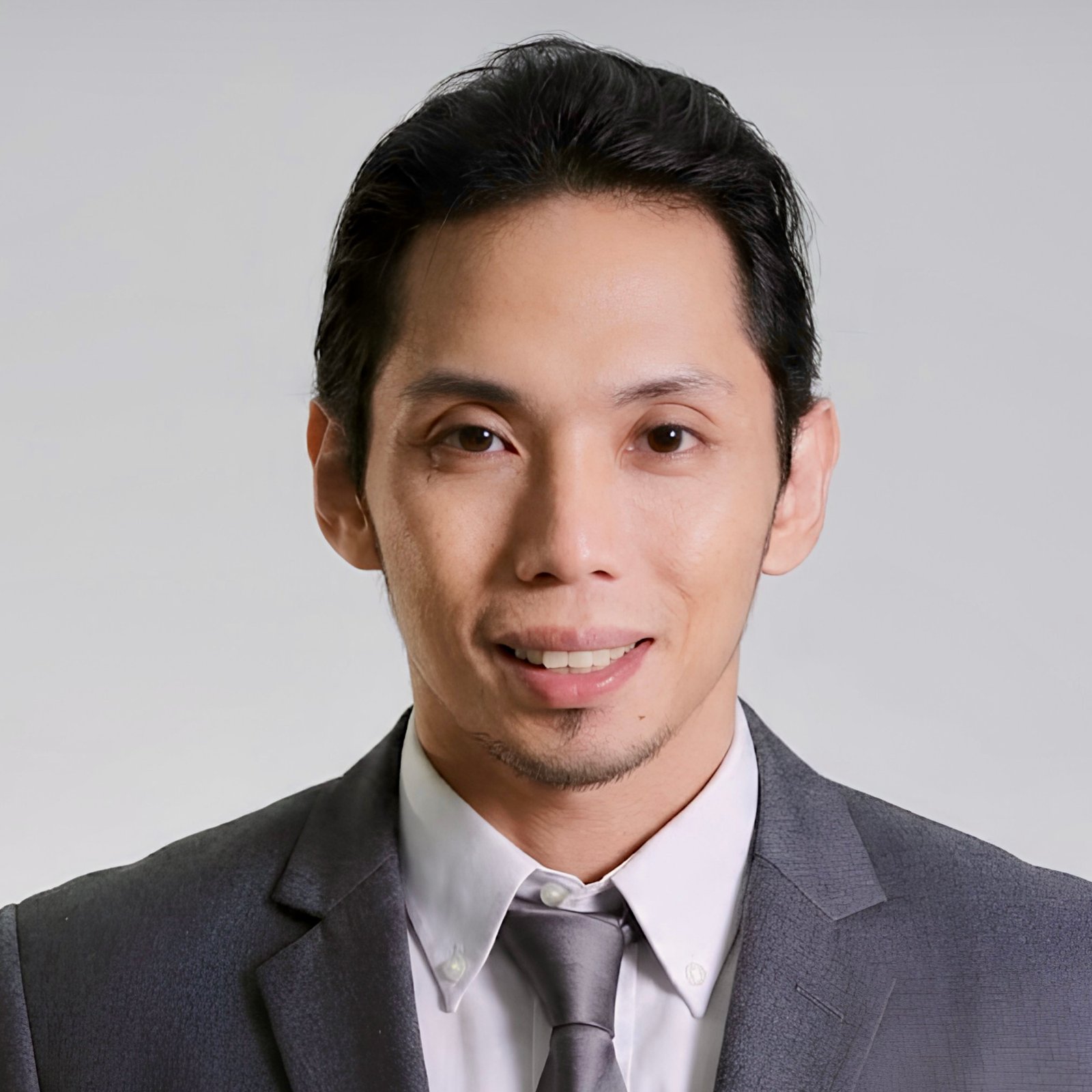 Portrait of Dennis B. Raflores, Managing Director